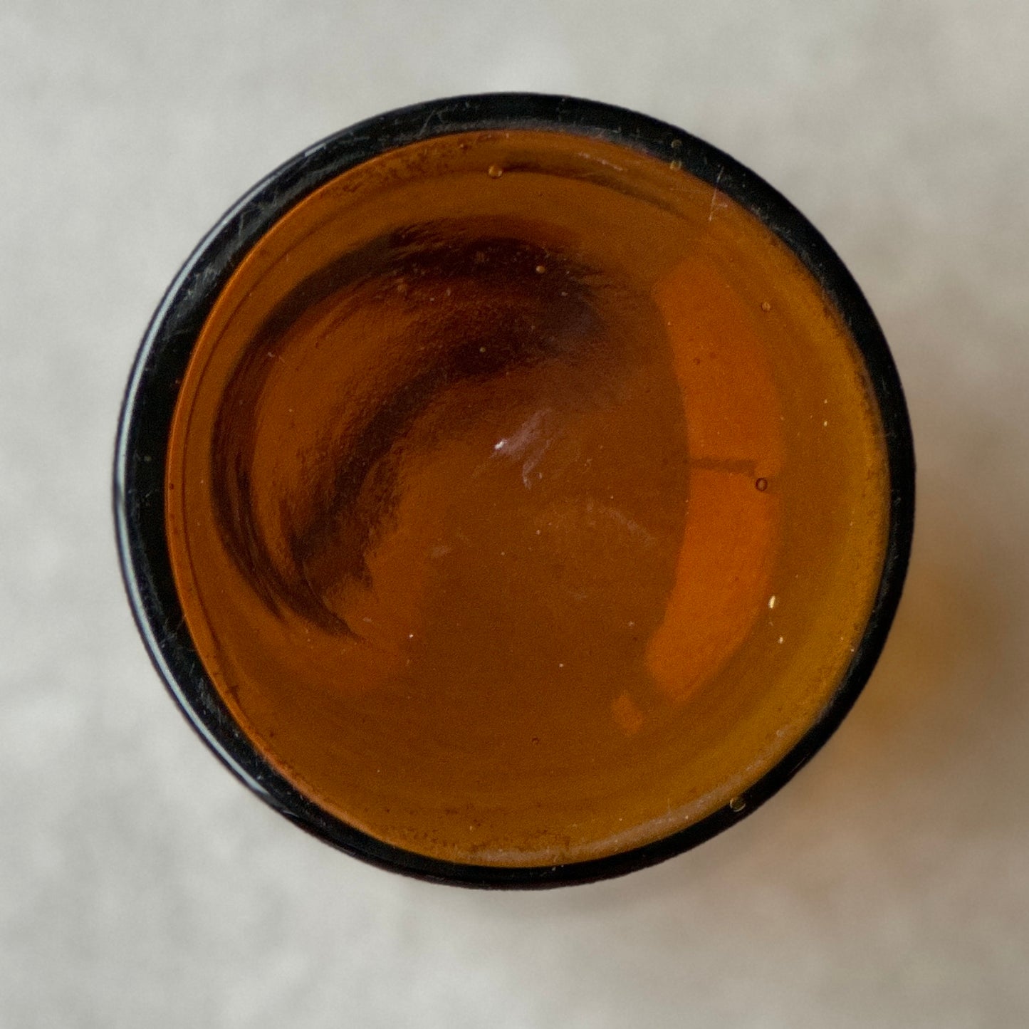 Pot à Pharmacie en Verre Ambré avec Bouchon en Bakélite Verte à Motifs - Etiquette "écorces de citron"